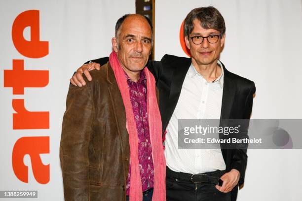 Actor Frederic Pierrot and Bruno Patino, Editorial Director of Arte, are seen, during the "En Therapie" Premiere, at Cinema l'Arlequin on March 28,...