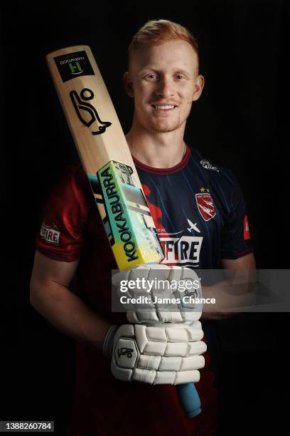 Jordan Cox of Kent Spitfires poses for a portrait in their Vitality Blast T20 kit during the Kent County Cricket Club Photocall at The Spitfire...