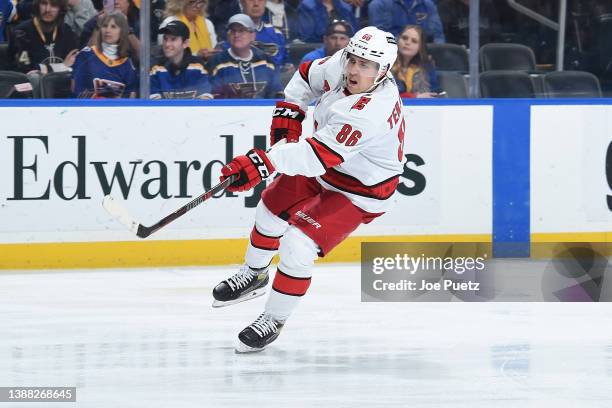 Teuvo Teravainen of the Carolina Hurricanes takes a shot against the St. Louis Blues at the Enterprise Center on March 26, 2022 in St. Louis,...