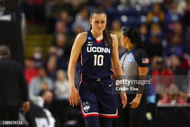 Nika Muhl of the UConn Huskies reacts after teammate Dorka Juhasz injures her wrist during the first half against the NC State Wolfpack in the NCAA...