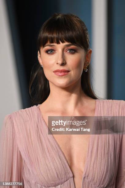 Dakota Johnson attends the 2022 Vanity Fair Oscar Party hosted by Radhika Jones at Wallis Annenberg Center for the Performing Arts on March 27, 2022...