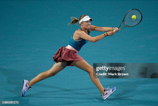 Linda Fruhvirtova of Czechia returns a shot to Paula Badosa of Spain during the Women’s Singles match on Day 8 of the 2022 Miami Open presented by...