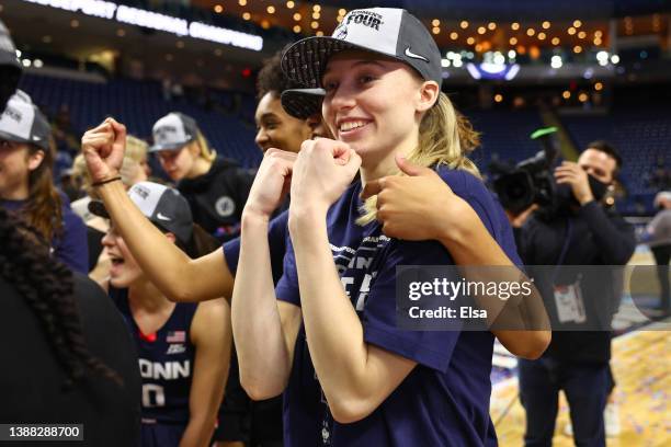 Paige Bueckers of the UConn Huskies poses after defeating the NC State Wolfpack 91-87 in 2 OT in the NCAA Women's Basketball Tournament Elite 8 Round...