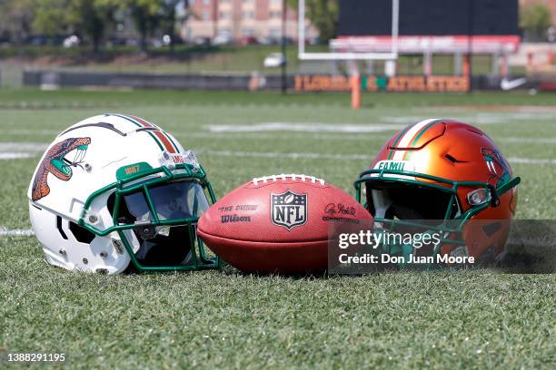 General of an official NFL Wilson "Duke" Football and a couple of Florida A&M Official Game Day Football Helmets before the start of Florida A&M Pro...