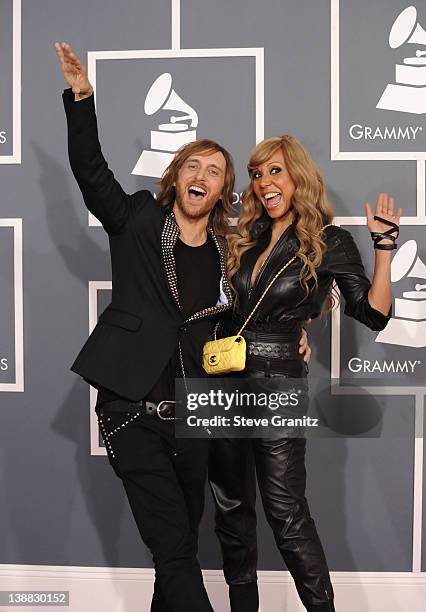 David Guetta and his wife Cathy Guetta arrive at The 54th Annual GRAMMY Awards at Staples Center on February 12, 2012 in Los Angeles, California.