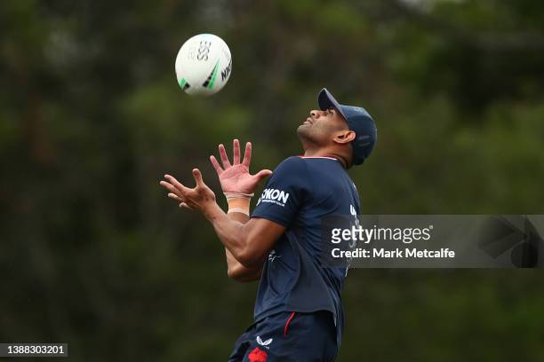 Daniel Tupou takes a high ball during a Sydney Roosters NRL training session at Kippax Lake on March 29, 2022 in Sydney, Australia.