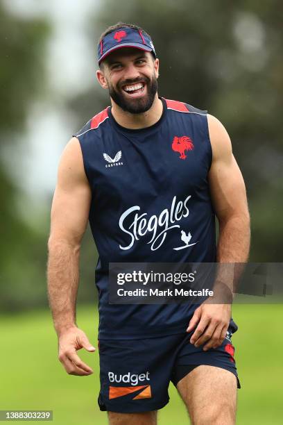 James Tedesco smiles during a Sydney Roosters NRL training session at Kippax Lake on March 29, 2022 in Sydney, Australia.