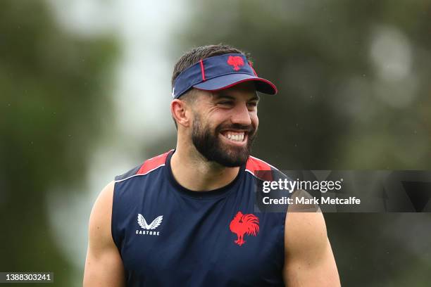 James Tedesco smiles during a Sydney Roosters NRL training session at Kippax Lake on March 29, 2022 in Sydney, Australia.