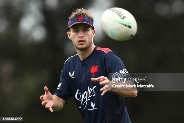 Sam Walker catches a ball during a Sydney Roosters NRL training session at Kippax Lake on March 29, 2022 in Sydney, Australia.