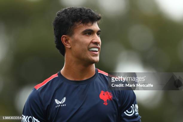Joseph Suaalii smiles during a Sydney Roosters NRL training session at Kippax Lake on March 29, 2022 in Sydney, Australia.