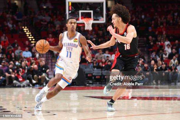 Theo Maledon of the Oklahoma City Thunder works towards the basket against CJ Elleby of the Portland Trail Blazers during overtime at Moda Center on...