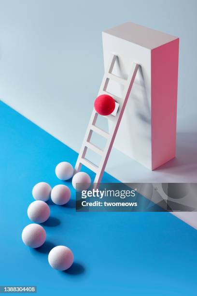 abstract leadership concepts still life with spheres. - climbing plant stock-fotos und bilder