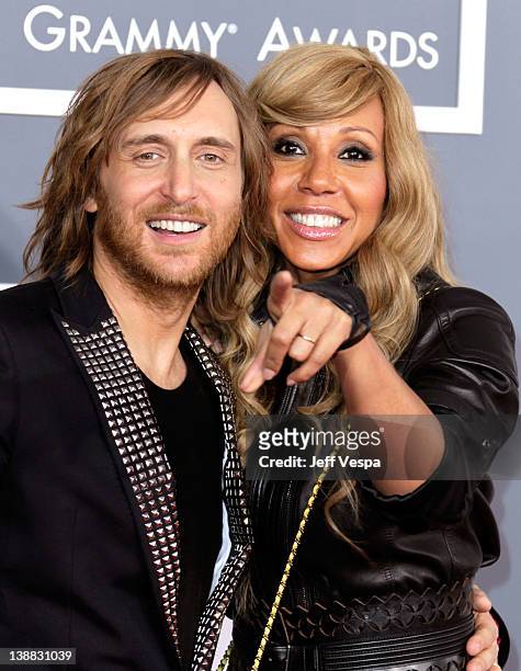 David Guetta and his wife Cathy Guetta arrive at The 54th Annual GRAMMY Awards at Staples Center on February 12, 2012 in Los Angeles, California.