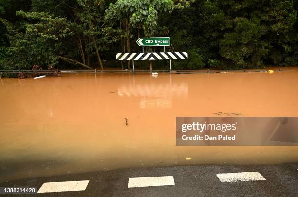 Floodwater inundate a road on March 29, 2022 in Lismore, Australia. Evacuation orders have been issued for towns across the NSW Northern Rivers...