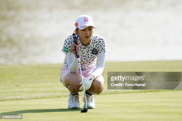 Rei Matsuda of Japan lines up a putt on the 18th green during the first round of the Rashink Ningineer/RKB Ladies at the Classic Golf Club on March...