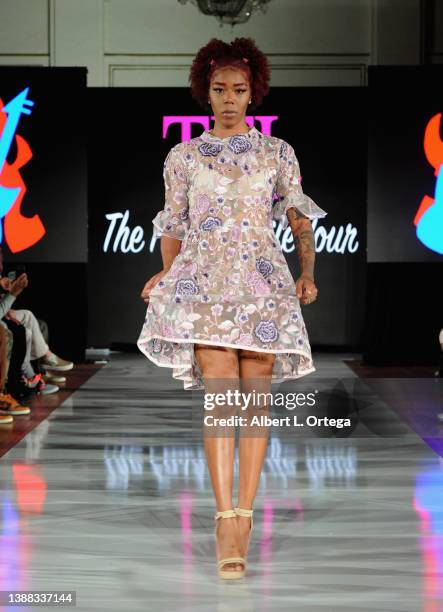 Mia Caperton walks the runway for Burning Guitars at The Fashion Life Tour Presents Arts N' Fashion For Fashion Week LA Hosted By Kiara Belen held at...