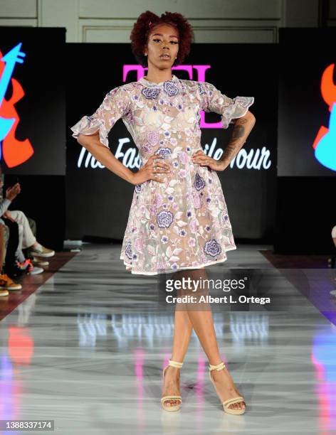 Mia Caperton walks the runway for Burning Guitars at The Fashion Life Tour Presents Arts N' Fashion For Fashion Week LA Hosted By Kiara Belen held at...