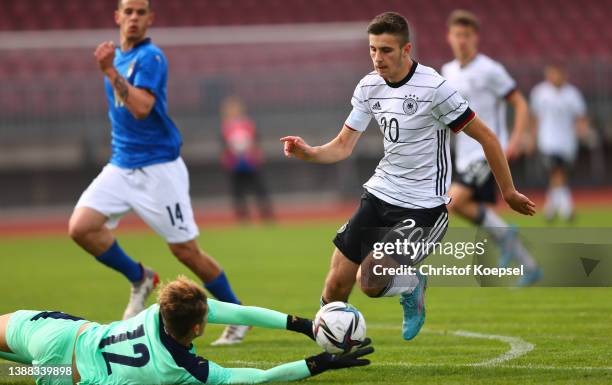 Leonardo Consiglio of Italy fouls Eliot Bujupi of Germany during the international friendly match between Germany U16 and Italy U16 on March 29, 2022...