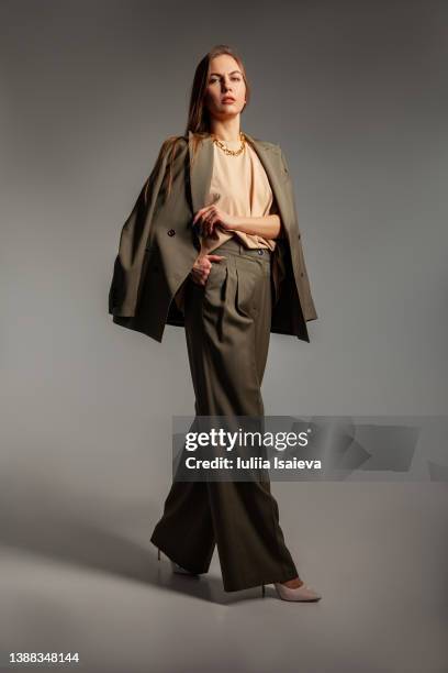 female model in elegant suit - woman full body isolated stock pictures, royalty-free photos & images