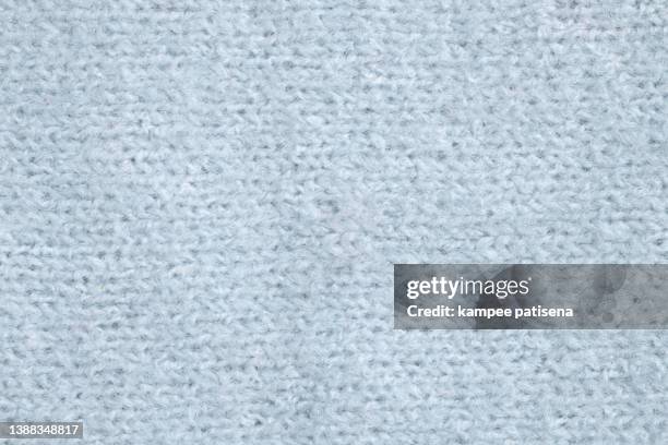 knitted warm grey sweater texture close up - vestido decorado fotografías e imágenes de stock