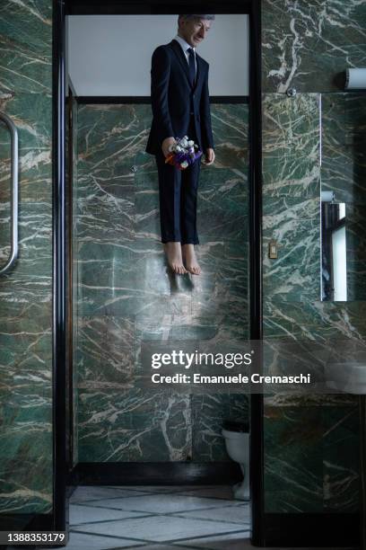 General view of ‘YOU’, a self-portrait sculpture of the Italian artist Maurizio Cattelan hanging from a noose, is pictured at Casa...