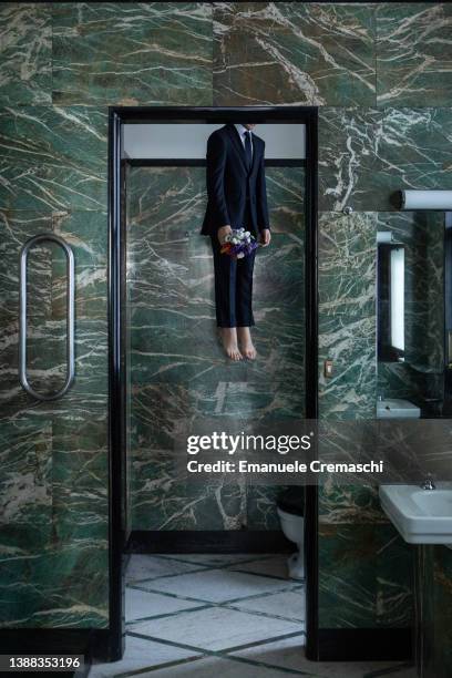 General view of ‘YOU’, a self-portrait sculpture of the Italian artist Maurizio Cattelan hanging from a noose, is pictured at Casa...