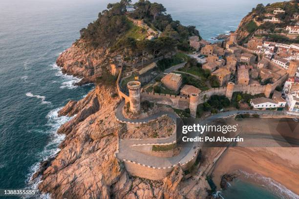 aerial view of tossa de mar and fortress vila vella at sunrise on costa brava, catalonia, spain. - vista do mar foto e immagini stock