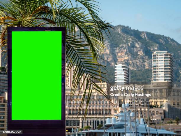 monte carlo monaco côte d'azur promenade beach coastline scene - 4k close-up - low angle view  of empty chroma key advertisement billboard commercial sign. concept for retail, economy and business growth, travel, tourism and marketing topics. - monaco shopping stock pictures, royalty-free photos & images