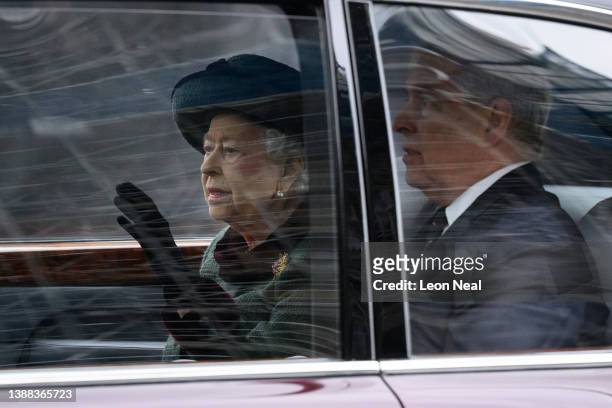 Britain's Queen Elizabeth II travels with her son Prince Andrew, Duke of York as they leave the Thanksgiving Service for the Duke Of Edinburgh at...