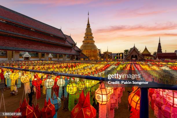 colorful lamp festival and lantern in loi krathong at wat phra that hariphunchai, lamphun province, thailand - chiang rai province stock pictures, royalty-free photos & images