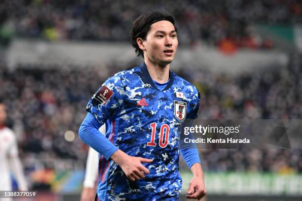 Takumi Minamino of Japan is seen during the FIFA World Cup Asian Qualifier Final Round Group B match between Japan and Vietnam at Saitama Stadium on...