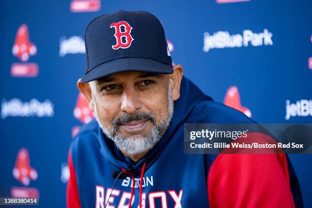 Manager Alex Cora of the Boston Red Sox addresses the media during a press conference during a spring training team workout on March 13, 2022 at...