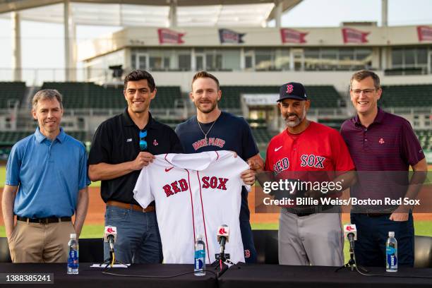 Trevor Story of the Boston Red Sox poses for a photograph with General Manager Brian O"u2019Halloran, Chief Baseball Officer Chaim Bloom, Manager...