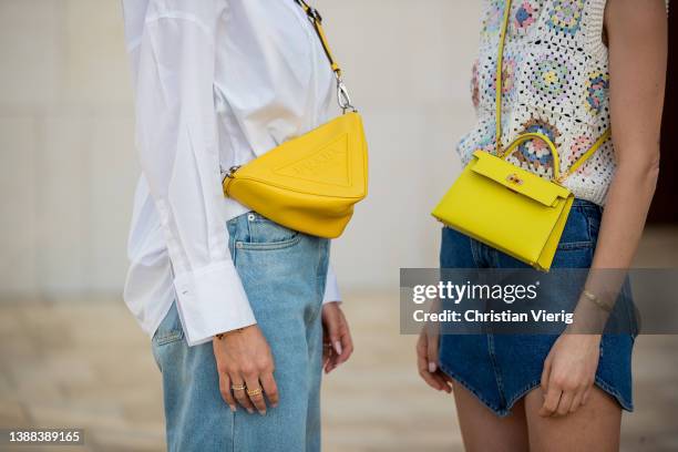 Ann-Kathrin Götze is seen wearing denim jeans & yellow bag Prada, white button shirt, sunglasses in black Chanel, black white sneakers & Lisa...