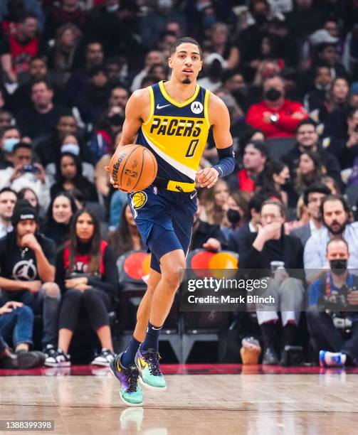 Tyrese Haliburton of the Indiana Pacers dribbles against the Toronto Raptors during the first half of their basketball game at the Scotiabank Arena...