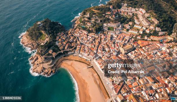 aerial view of fortress vila vella and badia de tossa bay at sunrise in tossa de mar town on costa brava in catalonia, spain. - tossa de mar stock pictures, royalty-free photos & images