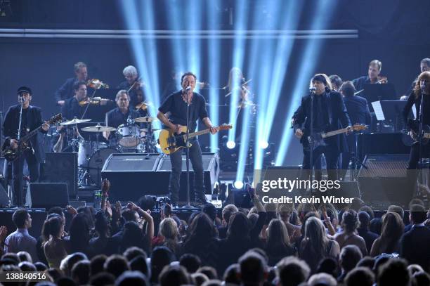 Musicians Nils Lofgren, Max Weinberg, Bruce Springsteen and Steven Van Zant of the E Street Band perform onstage at the 54th Annual GRAMMY Awards...