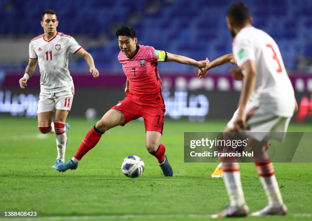 Son Heung Min of South Korea controls the ball during the FIFA World Cup Qatar 2022 qualification match between United Arab Emirates and South Korea...