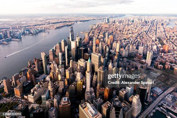 aerial view of manhattan downtown photographed from helicopter, new york city, usa - wall street photos et images de collection