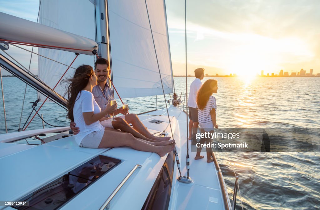 Fun family vacation on luxury yacht at sunrise
