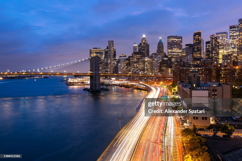 New York City skyline photographed with long exposure at dusk, high angle view, USA