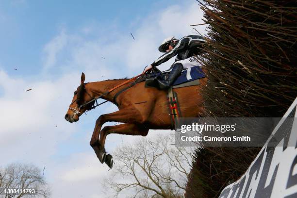 Racer clears a hurdle during the Spring Afternoon Racing at Uttoxeter Racecourse on March 29, 2022 in Uttoxeter, England.