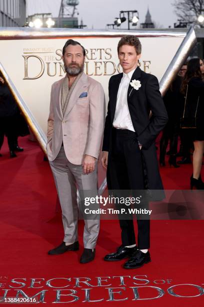 Jude Law and Eddie Redmayne attend the "Fantastic Beasts: The Secrets of Dumbledore" world premiere at The Royal Festival Hall on March 29, 2022 in...