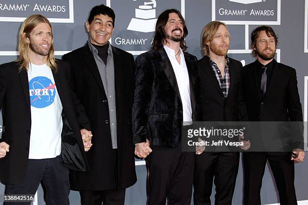 Musicians Taylor Hawkins, Pat Smear, Dave Grohl, Chris Shiflett and Nate Mendel of Foo Fighters arrive at The 54th Annual GRAMMY Awards at Staples...