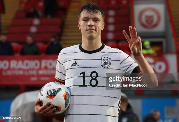 Dzenan Pejcinovic of Germany is seen with the match ball after scoring a hat trick during the UEFA Under17 European Championship Qualifier match...