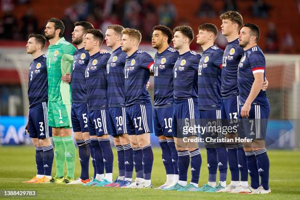 Players of Scotland stand for the national anthem prior to the International Friendly match between Austria and Scotland at Ernst Happel Stadion on...