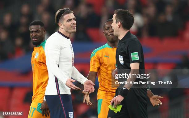 Serge Aurier of Cote D'Ivoire reacts after being shown a red card by match referee Erik Lambrechts during the international friendly match between...