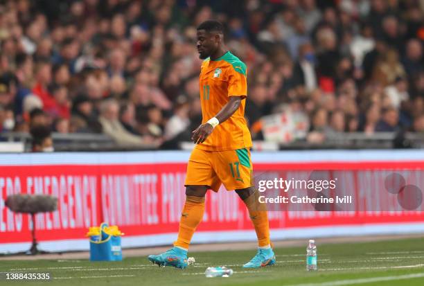 Serge Aurier of Cote D'Ivoire leaves the pitch after being sent off during the international friendly match between England and Cote D'Ivoire at...