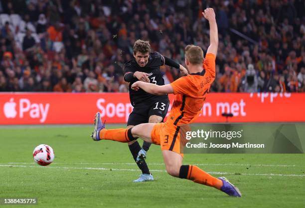 Thomas Mueller of Germany scores their side's first goal during the international friendly match between Netherlands and Germany at Johan Cruijff...