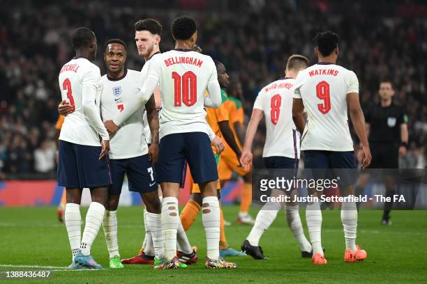 Raheem Sterling of England celebrates with teammates after scoring their team's second goal during the international friendly match between England...